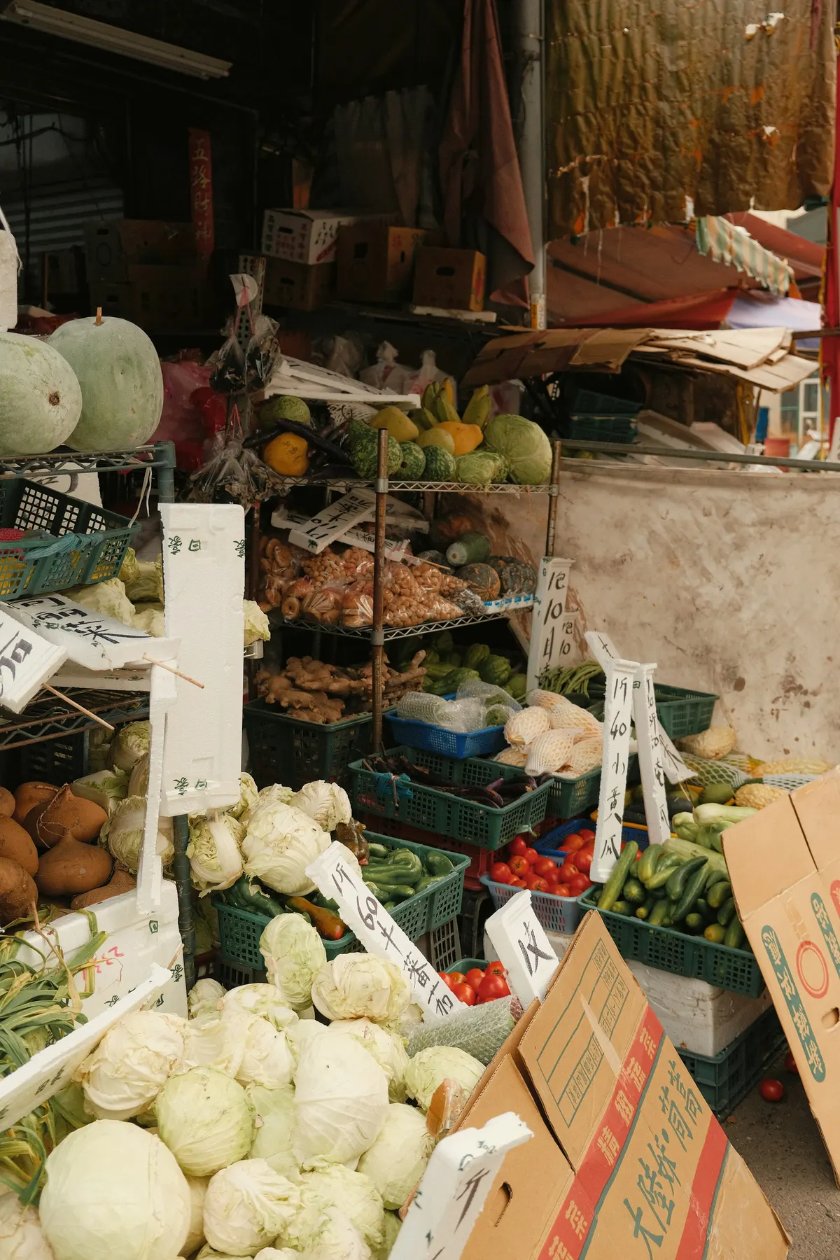 Fresh vegetables stacked on a market stall